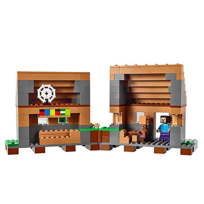 Character action figure standing among block-built village houses
